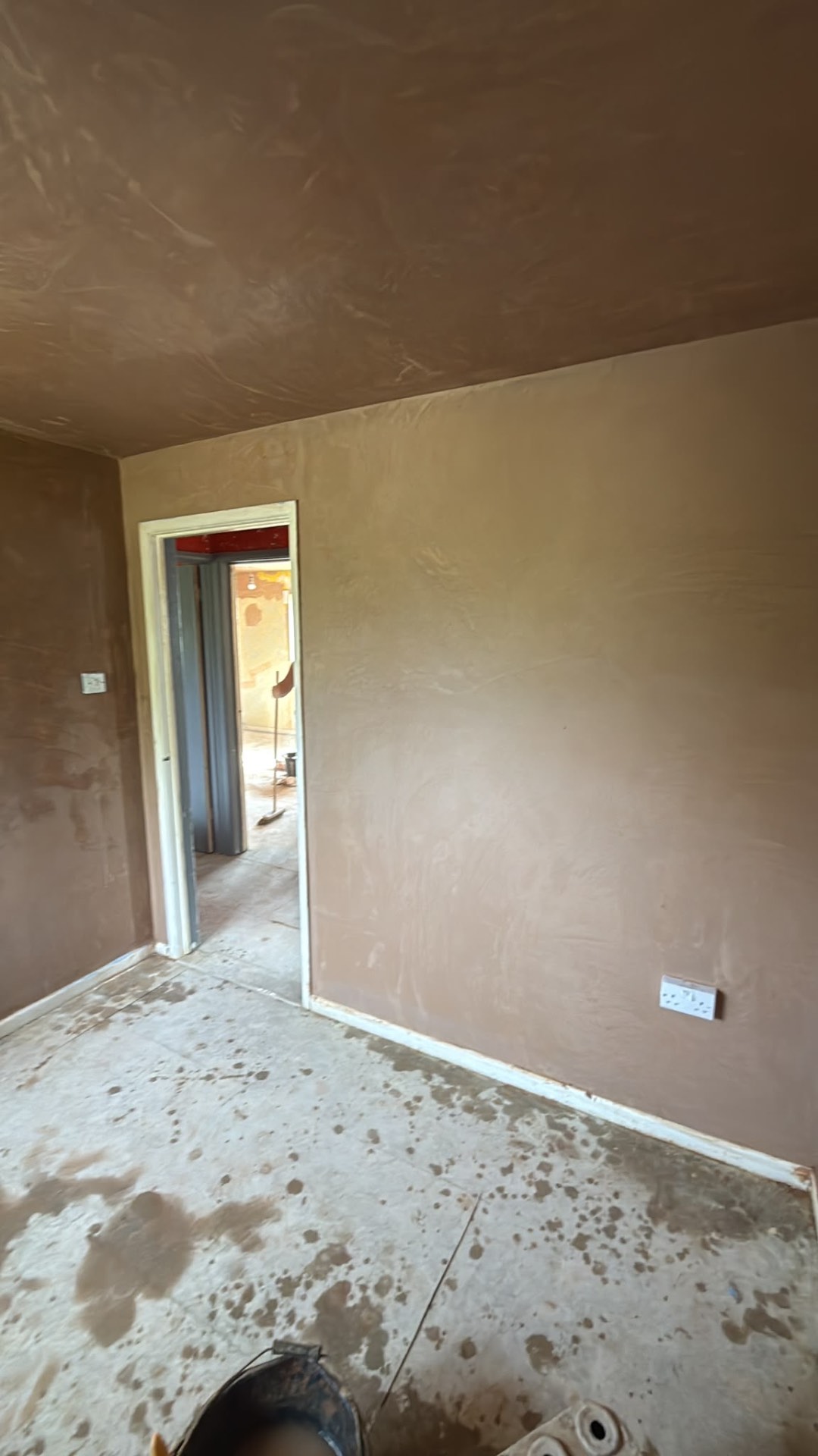 Walls and ceiling replastered during a whole-house renovation